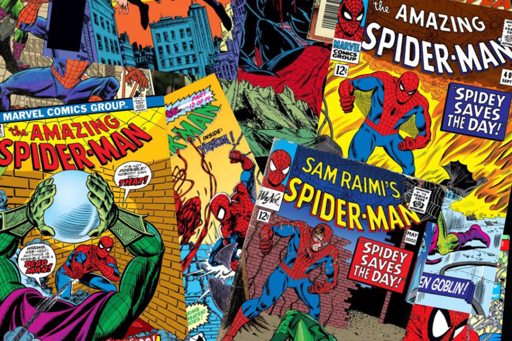 Coleção de quadrinhos com várias capas coloridas dispostas em uma mesa, destacando diferentes personagens do storytelling da Marvel.